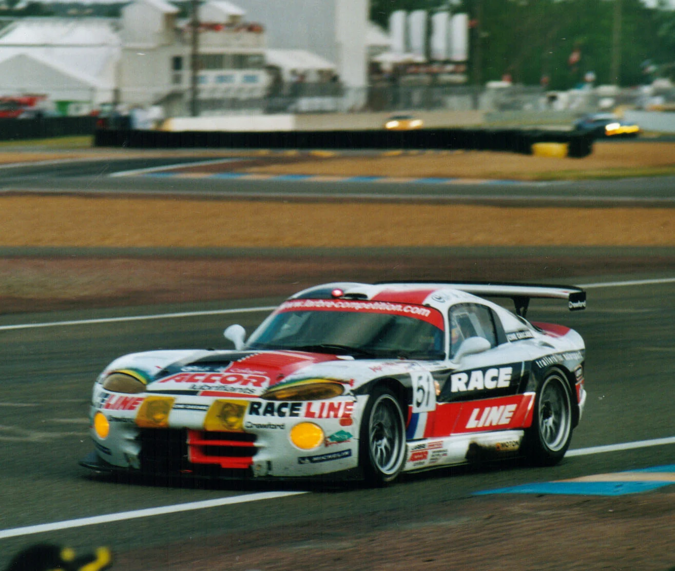 A competition car photographed on track.
